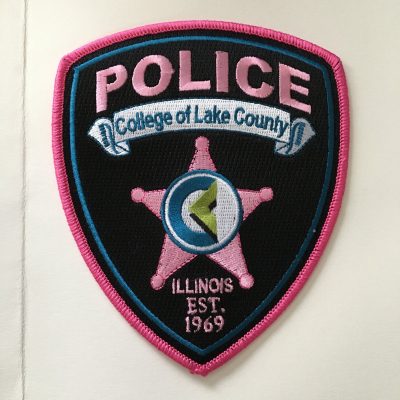 Pink patch worn by CLC’s Police Officers. Photo via Stephen Kelley.