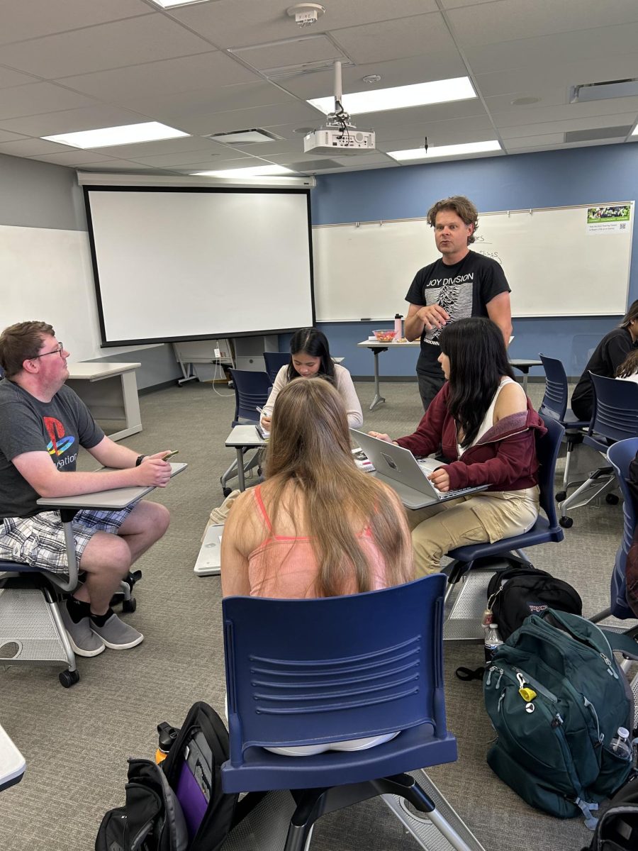 Speech Professor Joel Chmara engages students in one of his classes, Courtesy by Joel Chmara.
